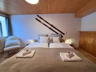 Ein Bett oder Betten in einem Zimmer der Unterkunft Appartement Wengen - Charme Alpin