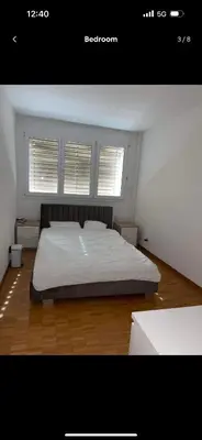 Ein Bett oder Betten in einem Zimmer der Unterkunft Sherd room in apartment