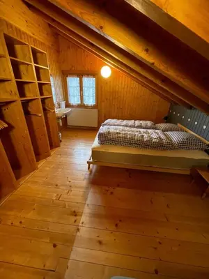 Ein Bett oder Betten in einem Zimmer der Unterkunft Chalet Rosablanche, since 1929 - peace, quiet & tradition