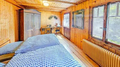 Ein Bett oder Betten in einem Zimmer der Unterkunft Chalet Rosablanche, since 1929 - peace, quiet & tradition