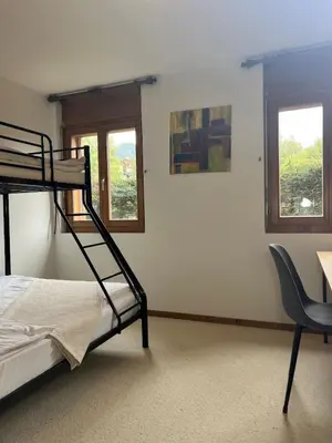 Ein Bett oder Betten in einem Zimmer der Unterkunft Apartment with a garden, close to golf