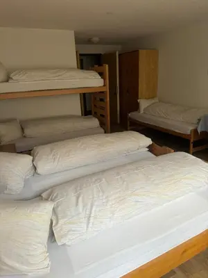 Ein Bett oder Betten in einem Zimmer der Unterkunft Hotel ilufa