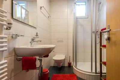 Ein Badezimmer in der Unterkunft Haus Alpenblick