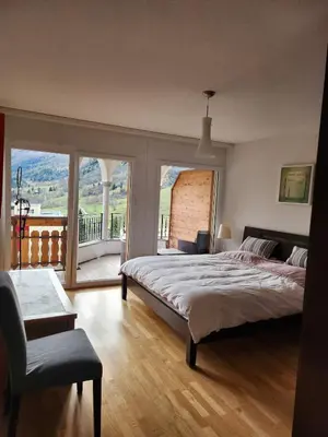 Ein Bett oder Betten in einem Zimmer der Unterkunft Résidence au cœur du village