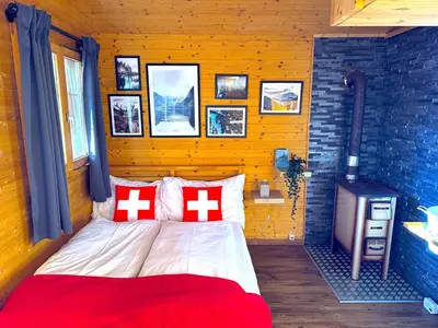 Ein Bett oder Betten in einem Zimmer der Unterkunft Idyllic Farm Cabin with Scenic Views and Concierge by SwissHut