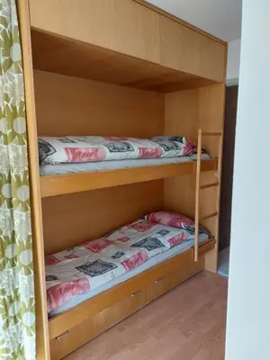 Ein Bett oder Betten in einem Zimmer der Unterkunft Belair 20 - Ski Pisten Erli, super Aussicht!