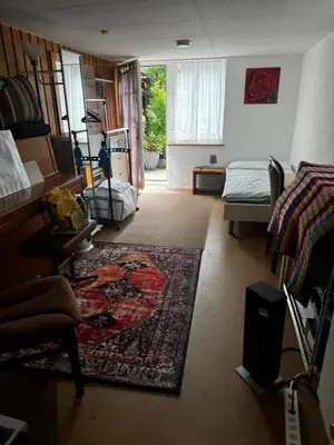 Ein Sitzbereich in der Unterkunft Small room