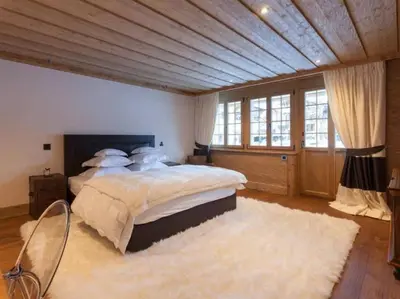 Ein Bett oder Betten in einem Zimmer der Unterkunft Stunning Modern Chalet with Indoor Pool and Spa