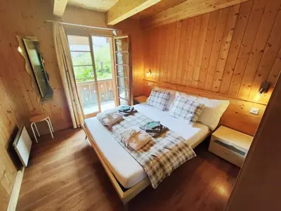 Ein Bett oder Betten in einem Zimmer der Unterkunft Entire Chalet with private Sauna
