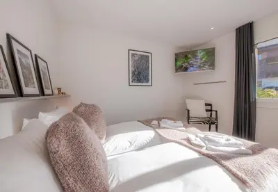 Ein Bett oder Betten in einem Zimmer der Unterkunft Chalet Silence