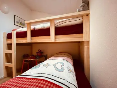 Ein Bett oder Betten in einem Zimmer der Unterkunft Ferienwohnung in Mörel