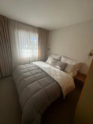 Ein Bett oder Betten in einem Zimmer der Unterkunft Chalet cosy avec vue sublime