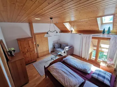 Ein Bett oder Betten in einem Zimmer der Unterkunft Appartement bei Selbstversorger auf Kleinbauernhof