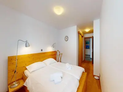 Ein Bett oder Betten in einem Zimmer der Unterkunft Lush chalet in Heremence with sauna