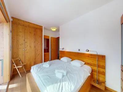 Ein Bett oder Betten in einem Zimmer der Unterkunft Lush chalet in Heremence with sauna