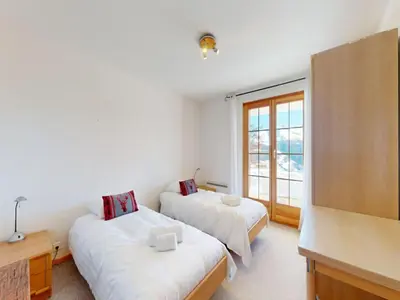 Ein Bett oder Betten in einem Zimmer der Unterkunft Chalet in Thyon-Les Collons