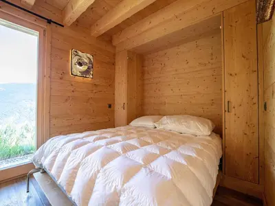 Ein Bett oder Betten in einem Zimmer der Unterkunft Apartment in Les Masses with terrace