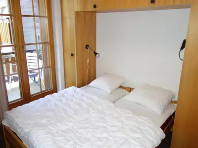 Ein Bett oder Betten in einem Zimmer der Unterkunft Apartment with balcony in Veysonnaz