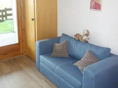 Ein Sitzbereich in der Unterkunft Cozy Apartment With Mountain Views
