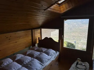 Ein Bett oder Betten in einem Zimmer der Unterkunft Pet-friendly chalet in Veysonnaz