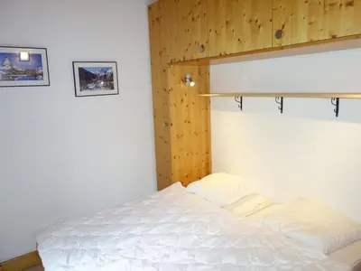 Ein Bett oder Betten in einem Zimmer der Unterkunft Hilltop apartment with views