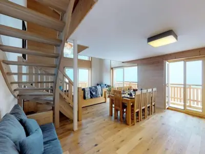 Ein Sitzbereich in der Unterkunft Apartment in Veysonnaz near Cable Car