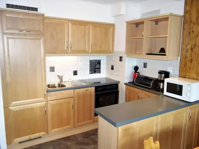 Küche/Küchenzeile in der Unterkunft Centrally-located apartment in Veysonnaz