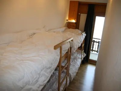 Ein Bett oder Betten in einem Zimmer der Unterkunft Mountain apartment with parking