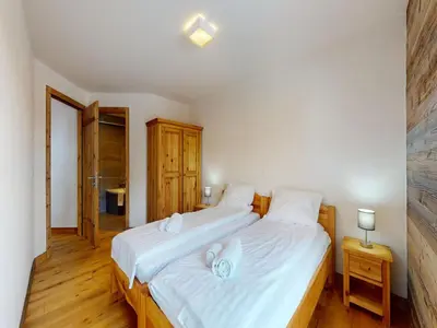 Ein Bett oder Betten in einem Zimmer der Unterkunft Apartment in Ski In Ski Out location