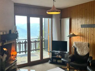 Ein Sitzbereich in der Unterkunft Modern apartment in Veysonnaz