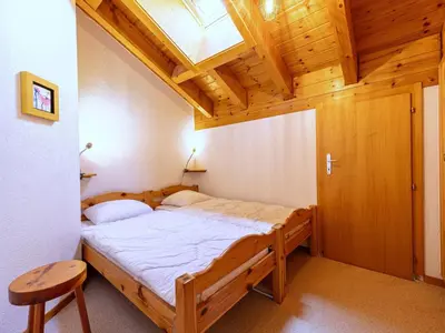 Ein Bett oder Betten in einem Zimmer der Unterkunft 3-bedroom apartment in Veysonnaz