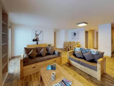 Ein Sitzbereich in der Unterkunft Mountain view apartment in Veysonnaz