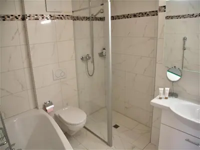 Ein Badezimmer in der Unterkunft Modern apartment with sauna