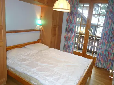Ein Bett oder Betten in einem Zimmer der Unterkunft Valley-view apartment in Veysonnaz