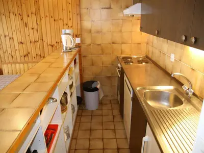 Küche/Küchenzeile in der Unterkunft Inviting apartment in Veysonnaz