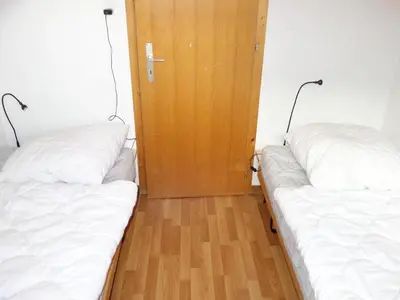 Ein Bett oder Betten in einem Zimmer der Unterkunft Valley-view apartment in Veysonnaz