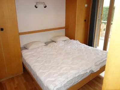 Ein Bett oder Betten in einem Zimmer der Unterkunft Valley-view apartment in Veysonnaz