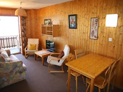 Ein Sitzbereich in der Unterkunft Apartment with Rhone valley view