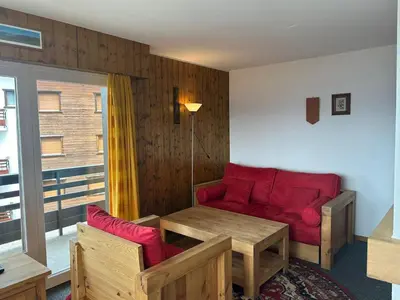 Ein Sitzbereich in der Unterkunft Charming apartment in Vaysonnaz