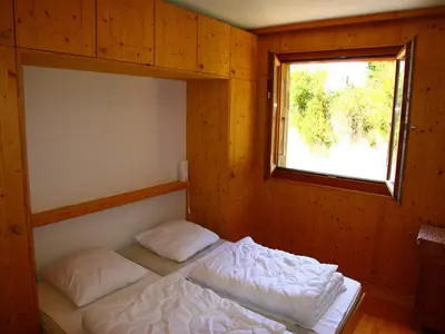 Ein Bett oder Betten in einem Zimmer der Unterkunft Apartment in Valais near Cable Car