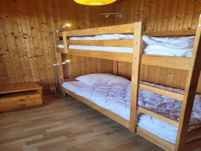 Ein Bett oder Betten in einem Zimmer der Unterkunft Sunny apartment with outdoor dinning