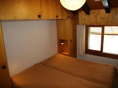 Ein Bett oder Betten in einem Zimmer der Unterkunft Apartment in Veysonnaz with Mountain Views