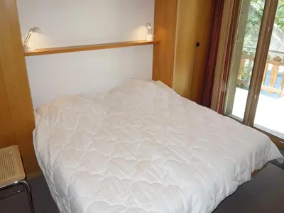 Ein Bett oder Betten in einem Zimmer der Unterkunft Apartment in 4 Vallées near Ski Lift