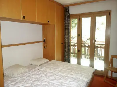 Ein Bett oder Betten in einem Zimmer der Unterkunft Apartment near Cable Car with Valley Views