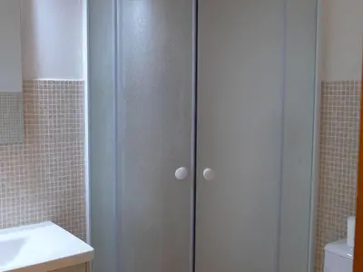 Ein Badezimmer in der Unterkunft 2-room apartment in Veysonnaz