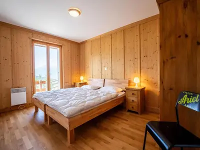 Ein Bett oder Betten in einem Zimmer der Unterkunft Chalet in Veysonnaz with balcony