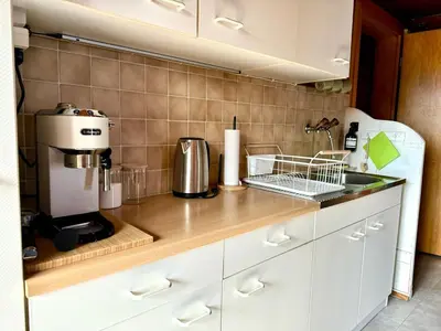 Küche/Küchenzeile in der Unterkunft Unverbaute See- und Bergsicht Wohnung 2 Balkone