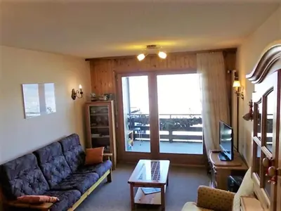 Ein Sitzbereich in der Unterkunft Apartment in Veysonnaz near Ski Gondola