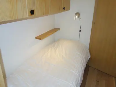 Ein Bett oder Betten in einem Zimmer der Unterkunft Apartment in Veysonnaz with Private Balcony