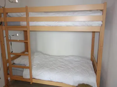 Ein Bett oder Betten in einem Zimmer der Unterkunft Cosy apartment with balcony